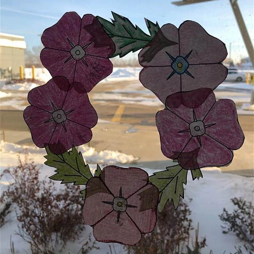 A different Remembrance Day wreath on the window.